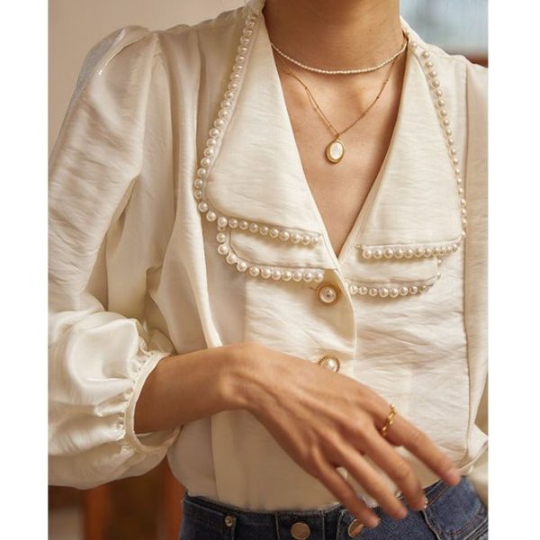 1742824325251207168 New French Style Retro Design Niche Bubble Sleeve Elegant Top