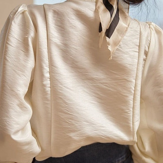 904d4b66-39e1-4683-840e-42bd51f354c1 New French Style Retro Design Niche Bubble Sleeve Elegant Top